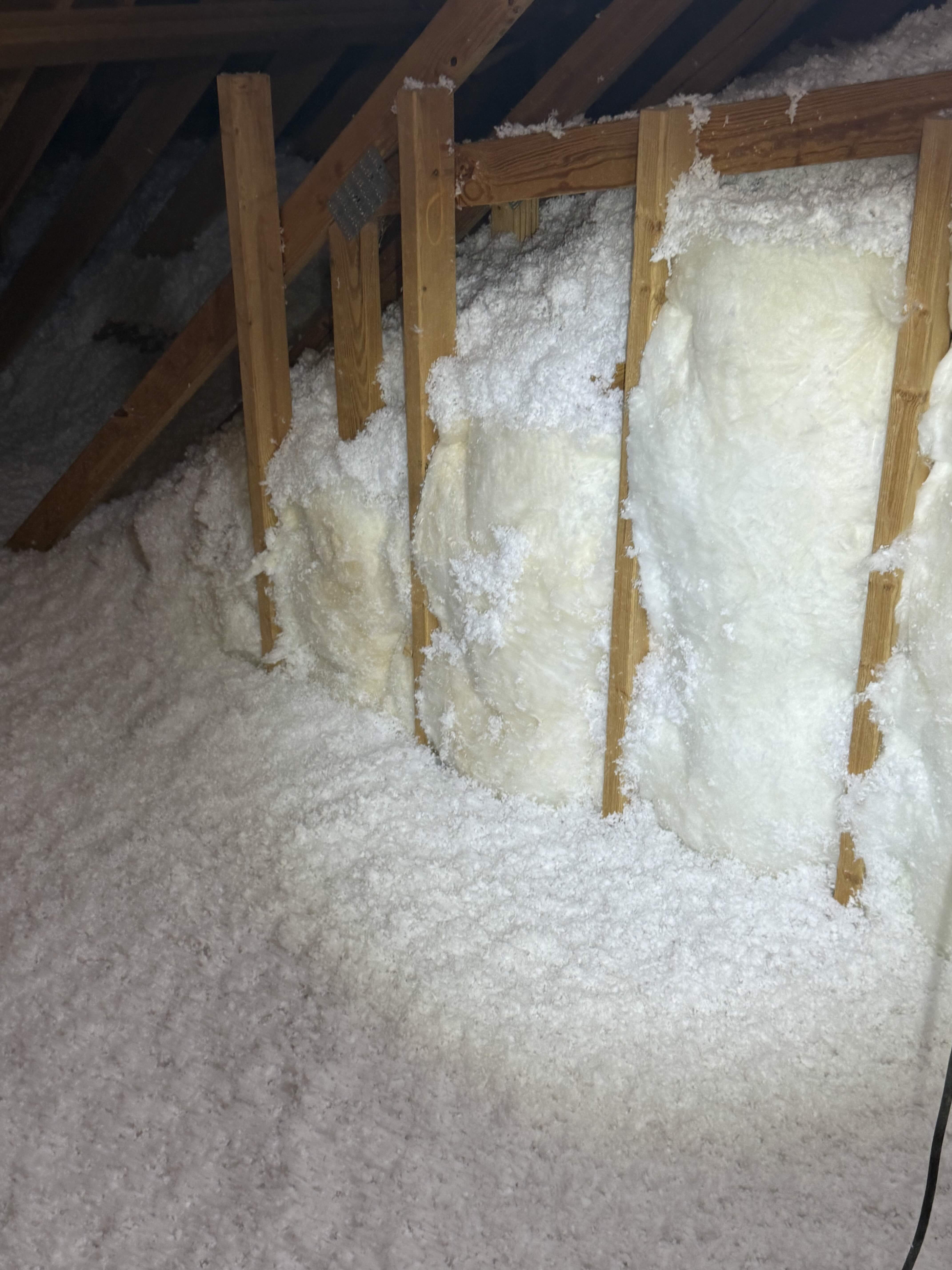 Attic wall batt insulation and blown-in floor insulation after remediation