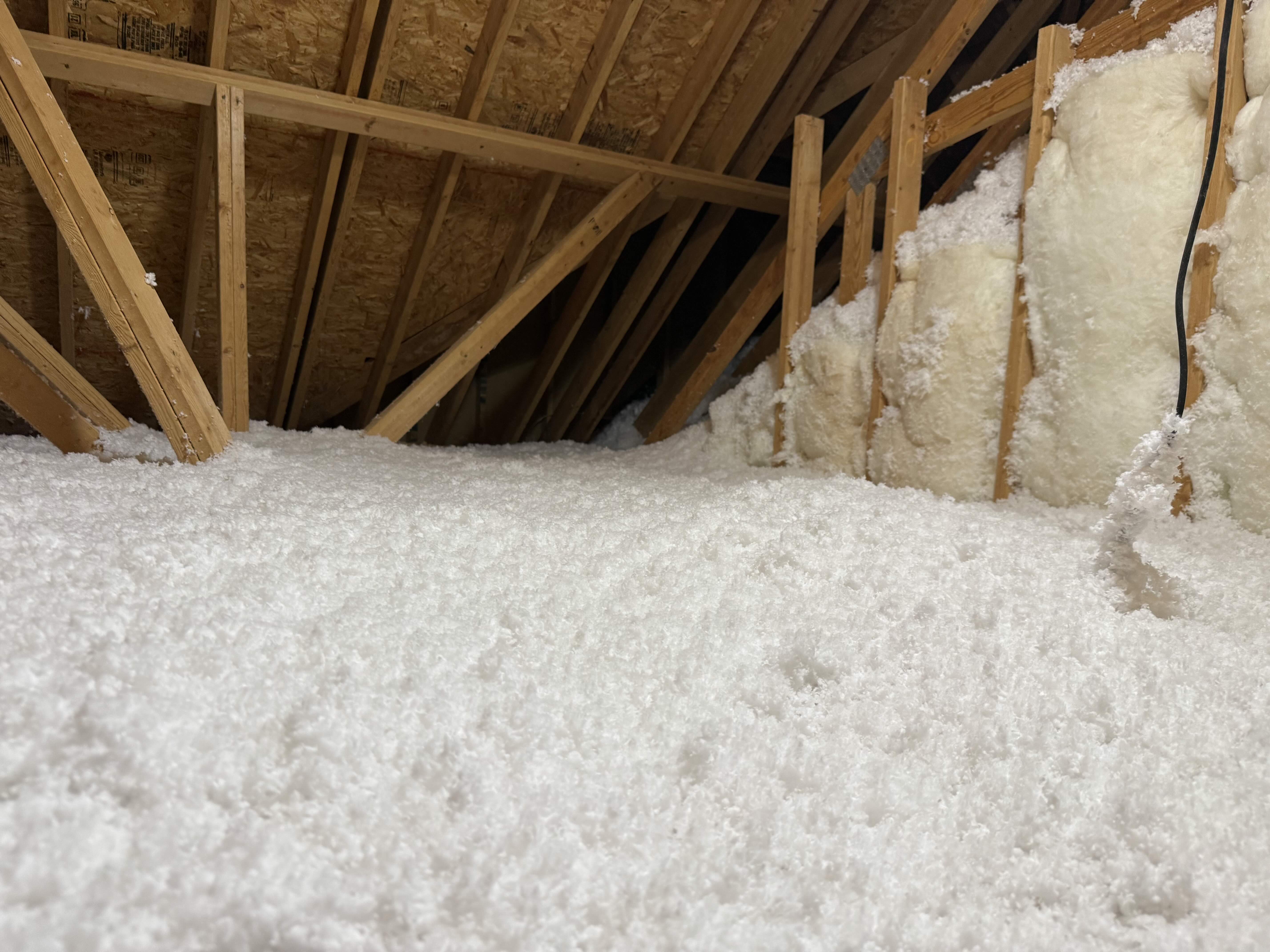 Completed attic remediation with new blown-in fiberglass and batt wall insulation