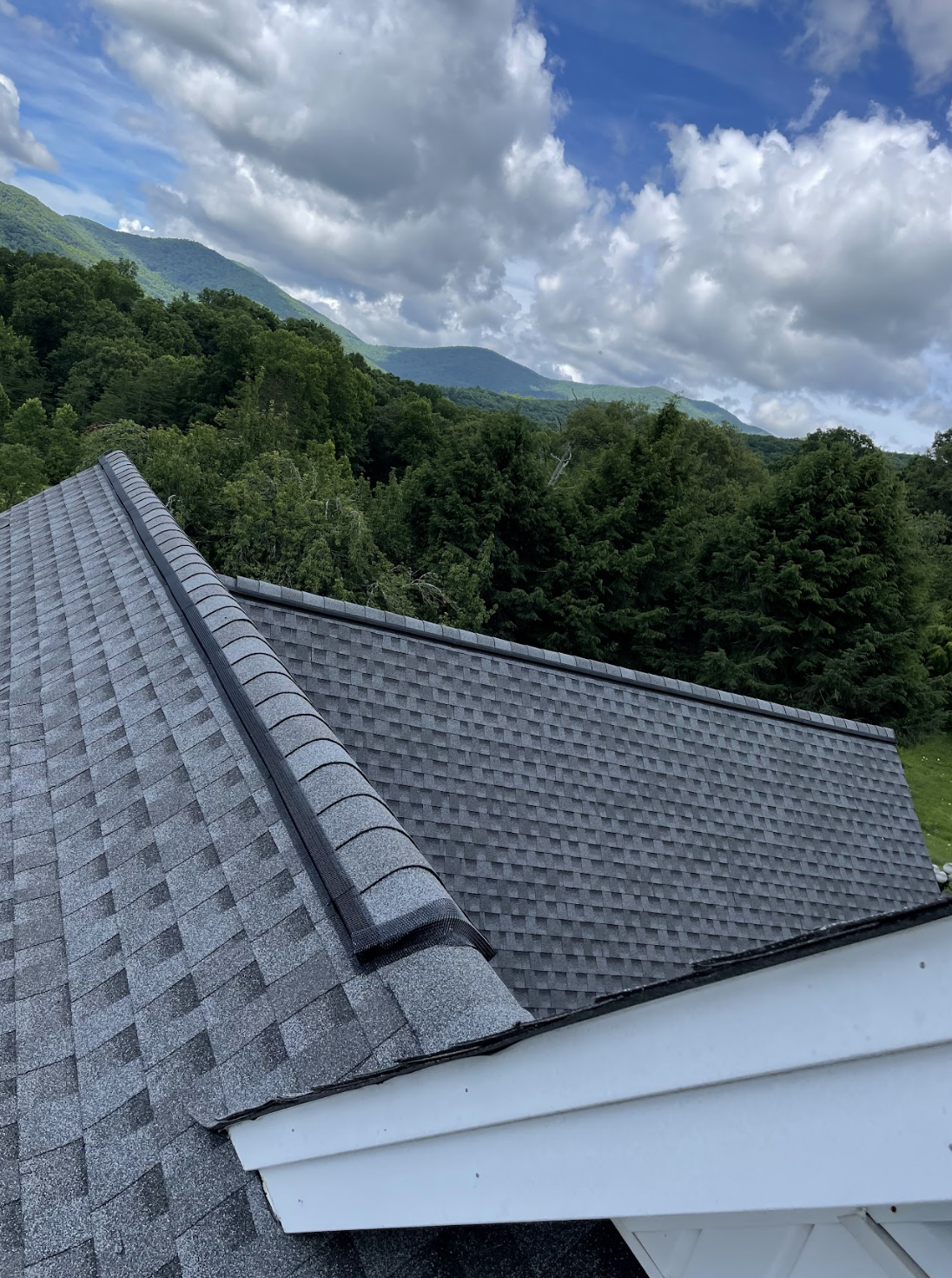 Completed ridge vent installation running full length of roof ridge with no gaps